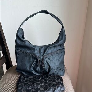 Gucci Black Signature G canvas shoulder Bag with exterior pockets